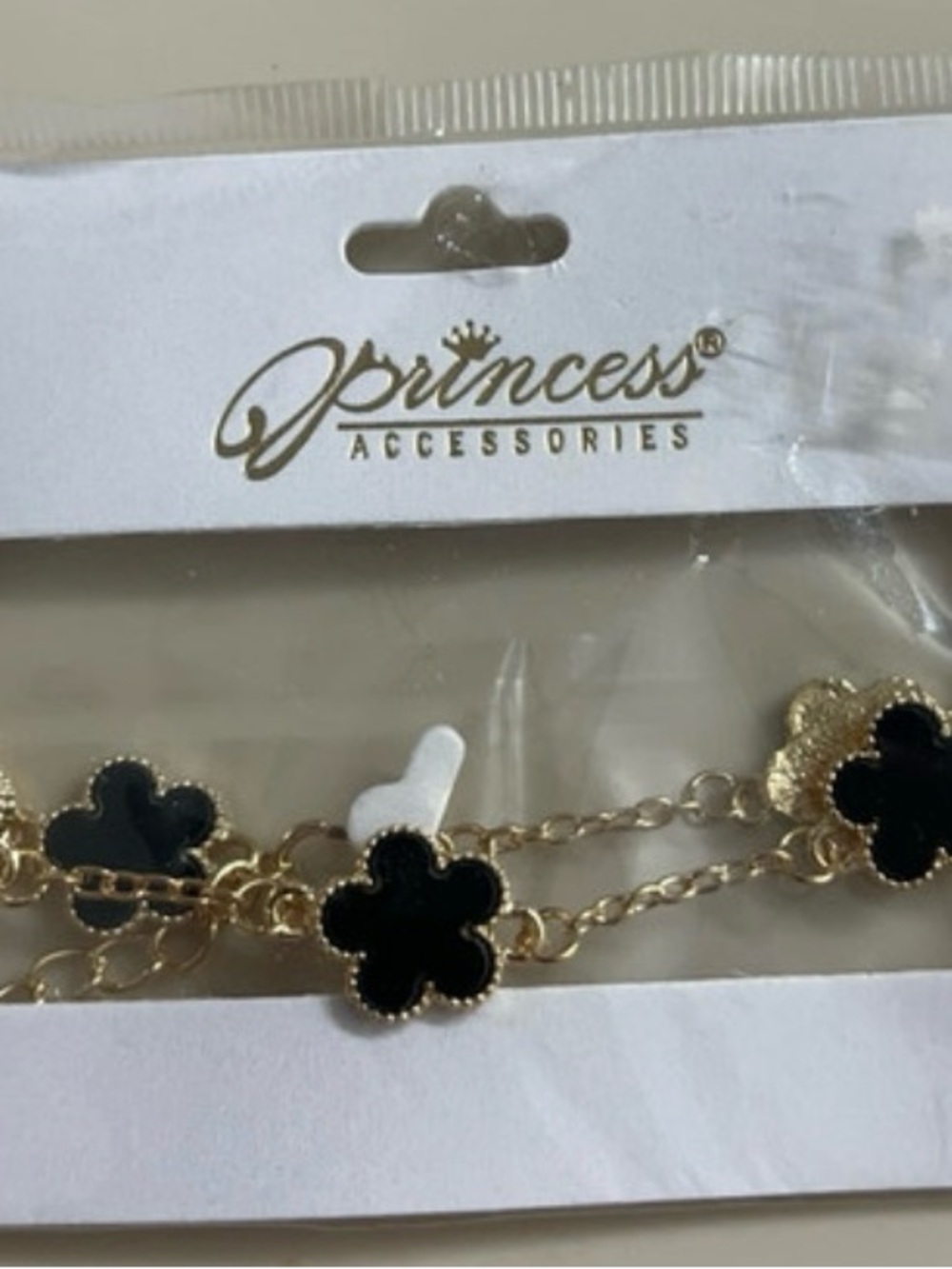 Gold Chain Bracelet with Black Clover Accents